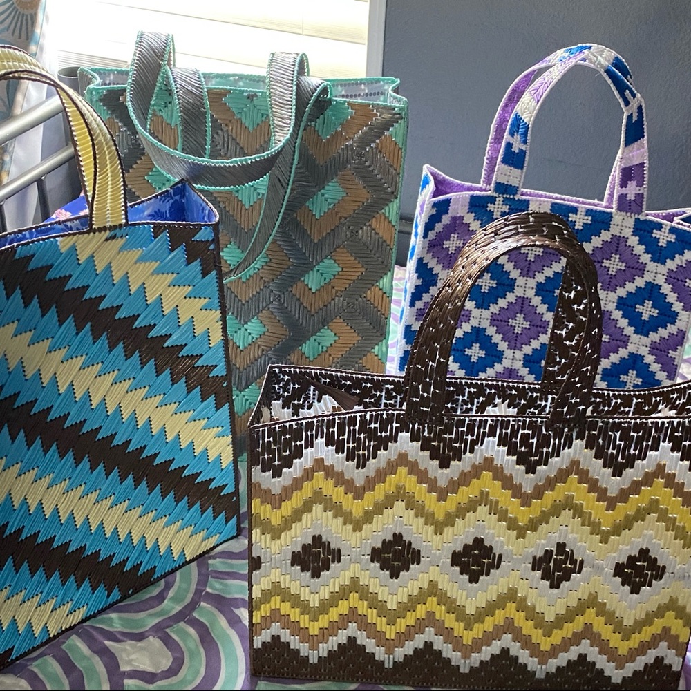 It’s handmade plastic canvas totes bags
